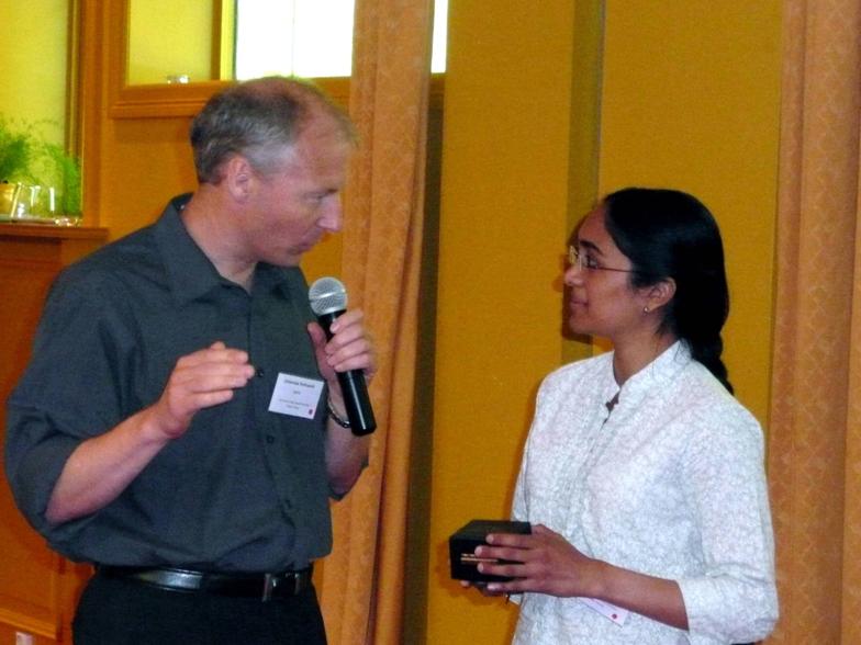 2009 IISW Best Poster Award presented by Johannes Solhusvik to Gayathri Nampoothiri of Delft University